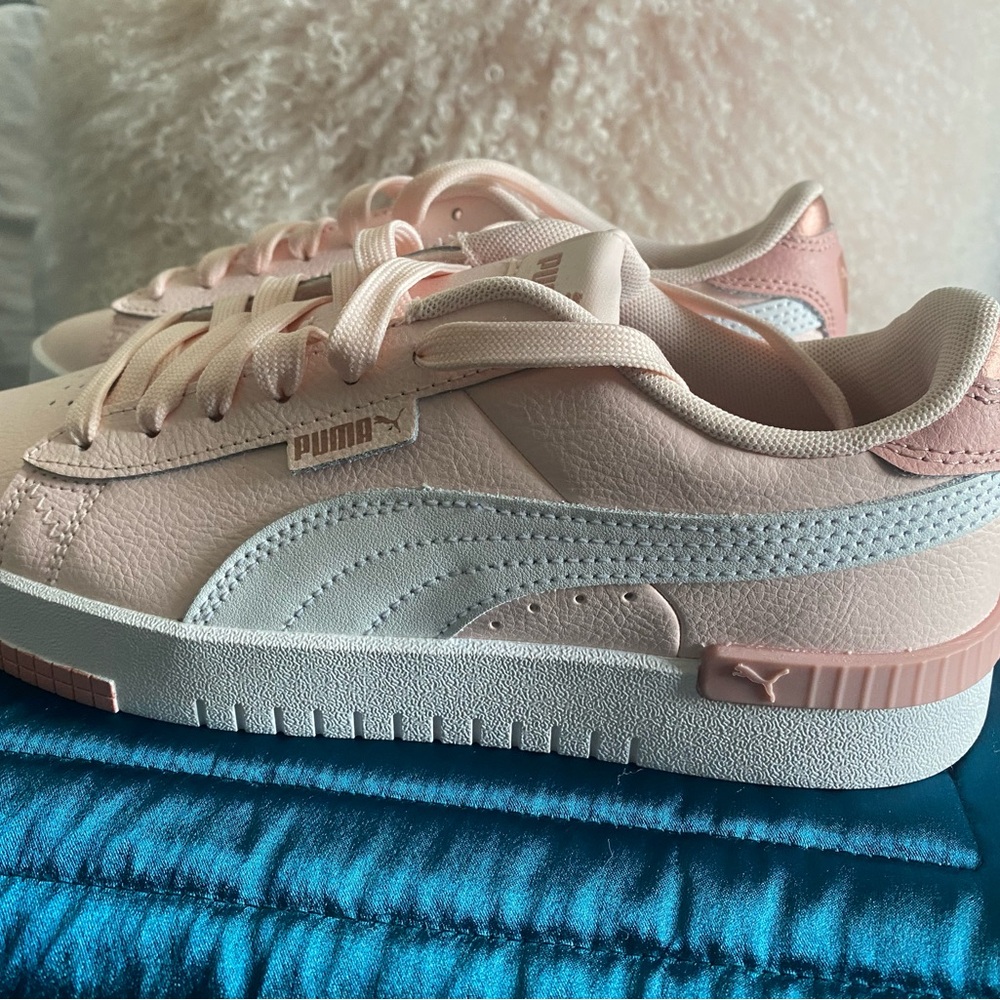 Puma Pink Sneakers with Sleek Design and White Accents